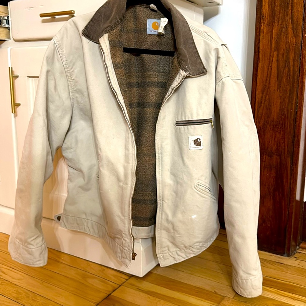 Weathered carhartt winter jacket. Flannel lined. Broken in.
